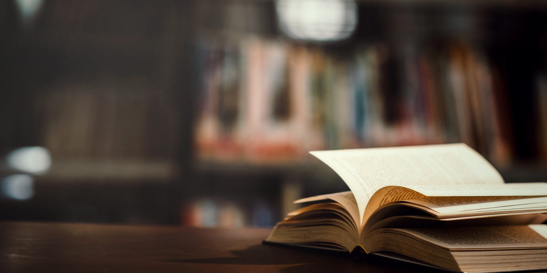 Book in library with open textbook,education learning concept