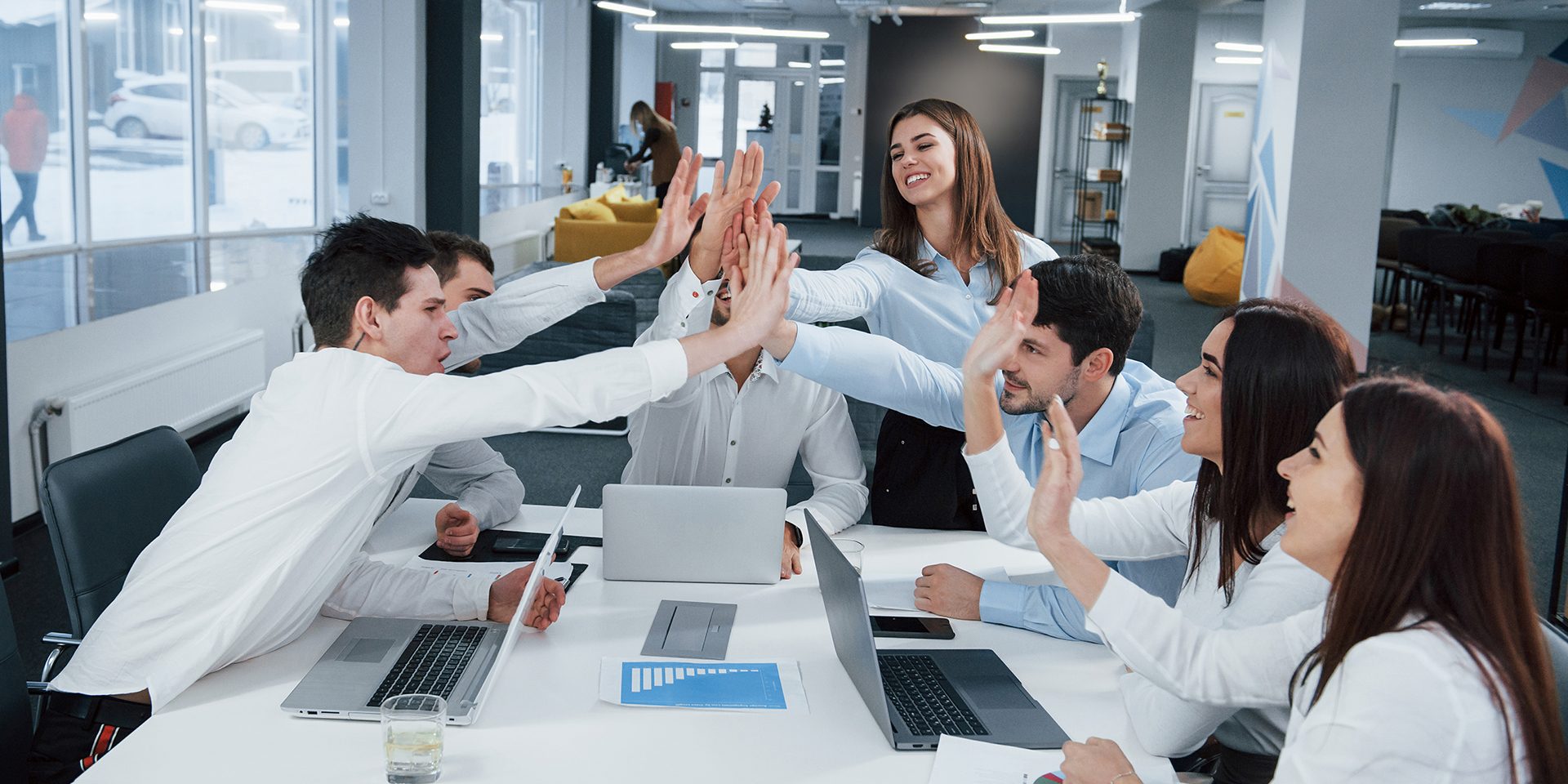 Cheerful business people. Job is done. Group of office workers happy to hit their own records and being successful