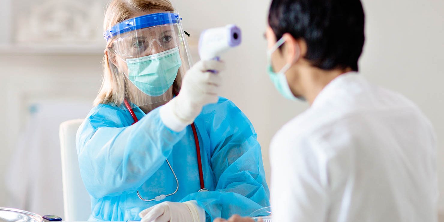 Doctor,Examining,Sick,Patient,For,Coronavirus.,Ill,Asian,Man,In